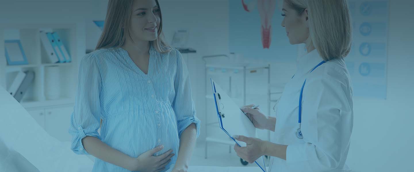 фото беременной женщины и врача гинеколога